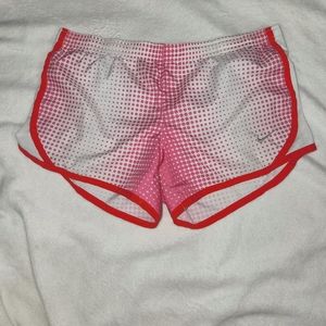 Pink, White, and Red Youth Nike shorts